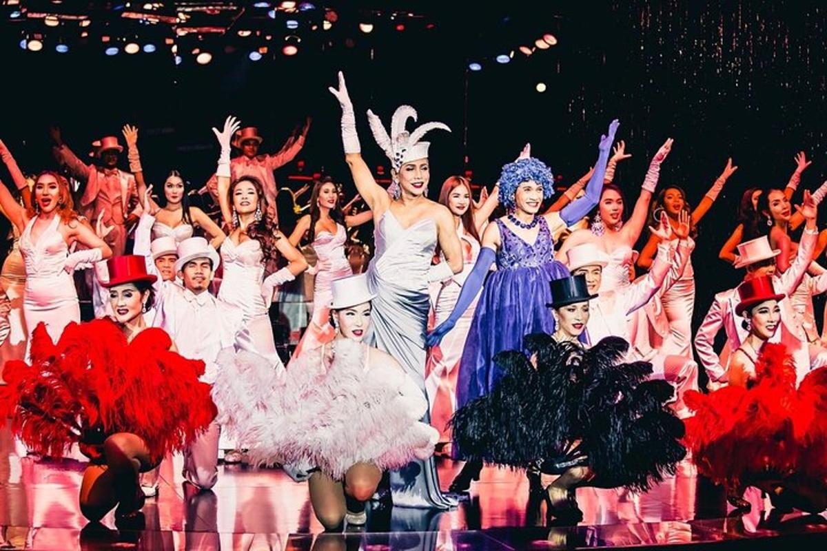 a group of people in fancy costumes on a stage