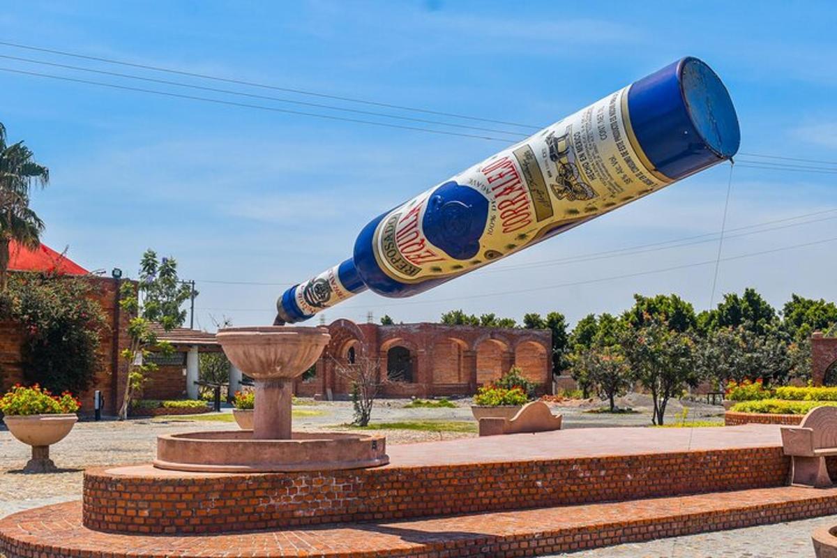 a large bottle in the middle of a fountain