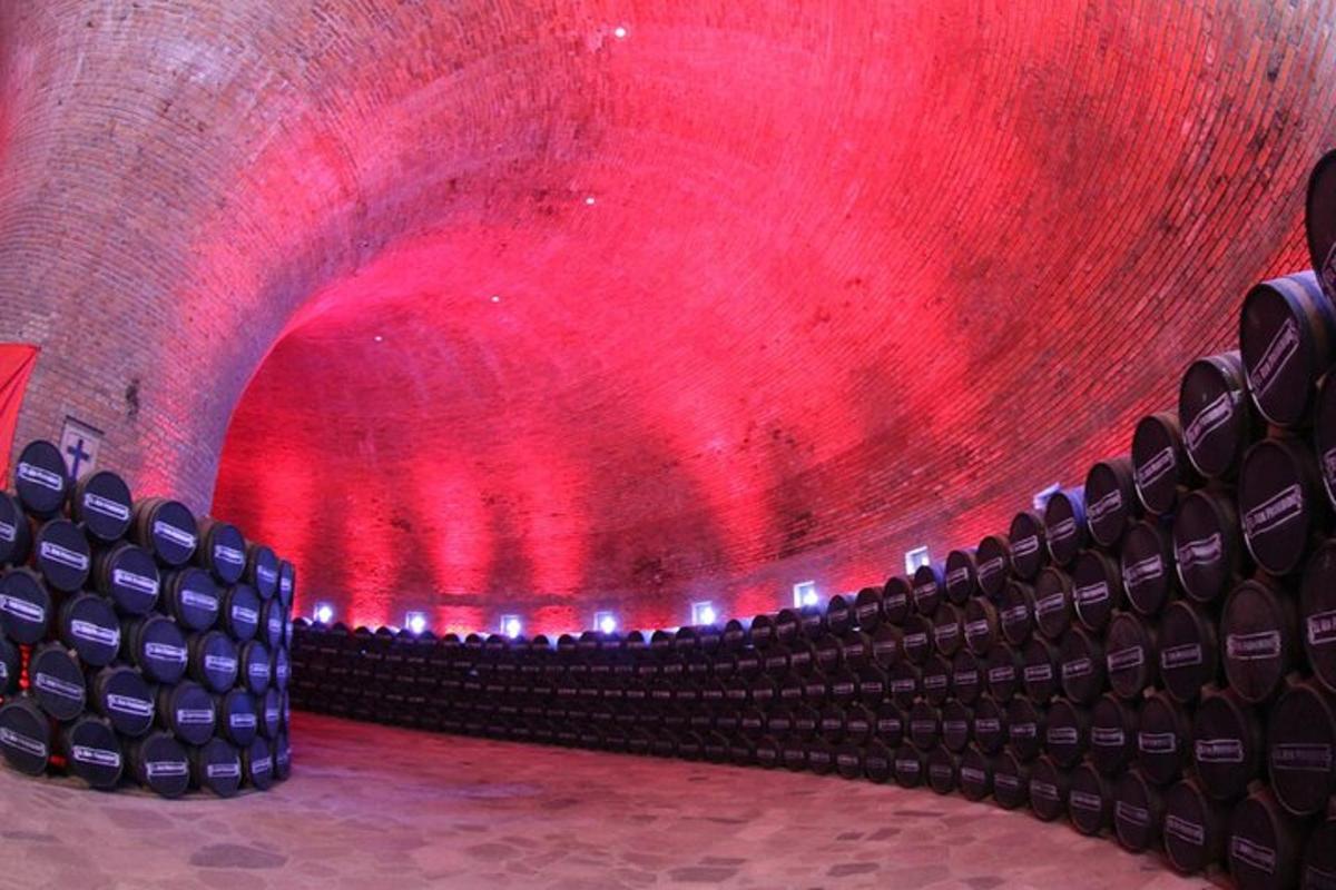 an empty auditorium with red lights in a theatre