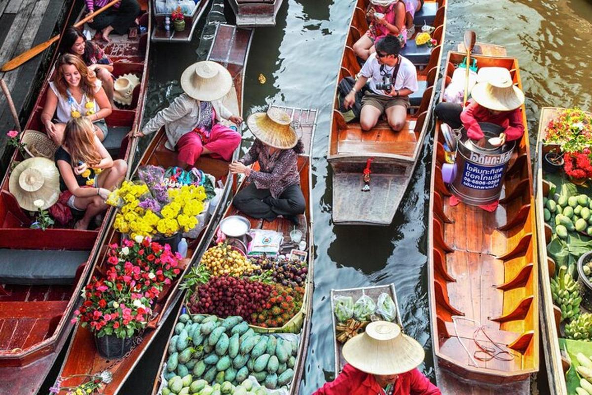 a group of people on boats with fruits and vegetables