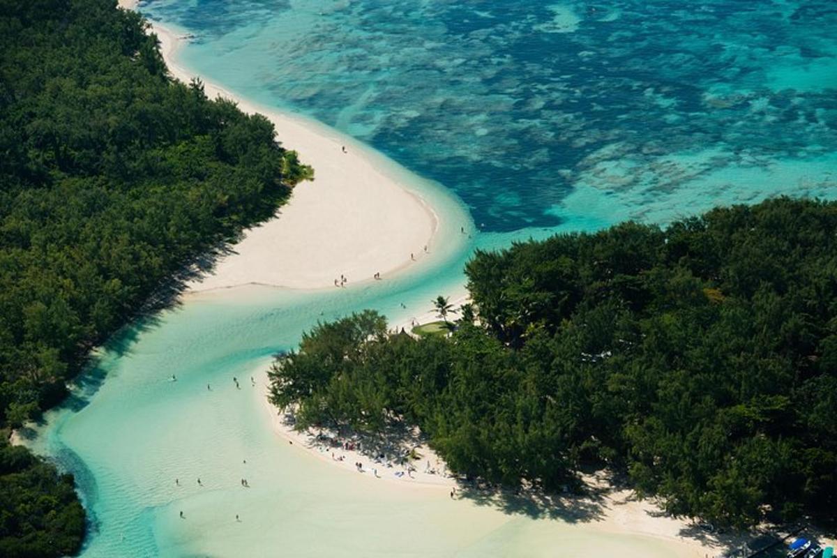 an aerial view of a beach with people on it
