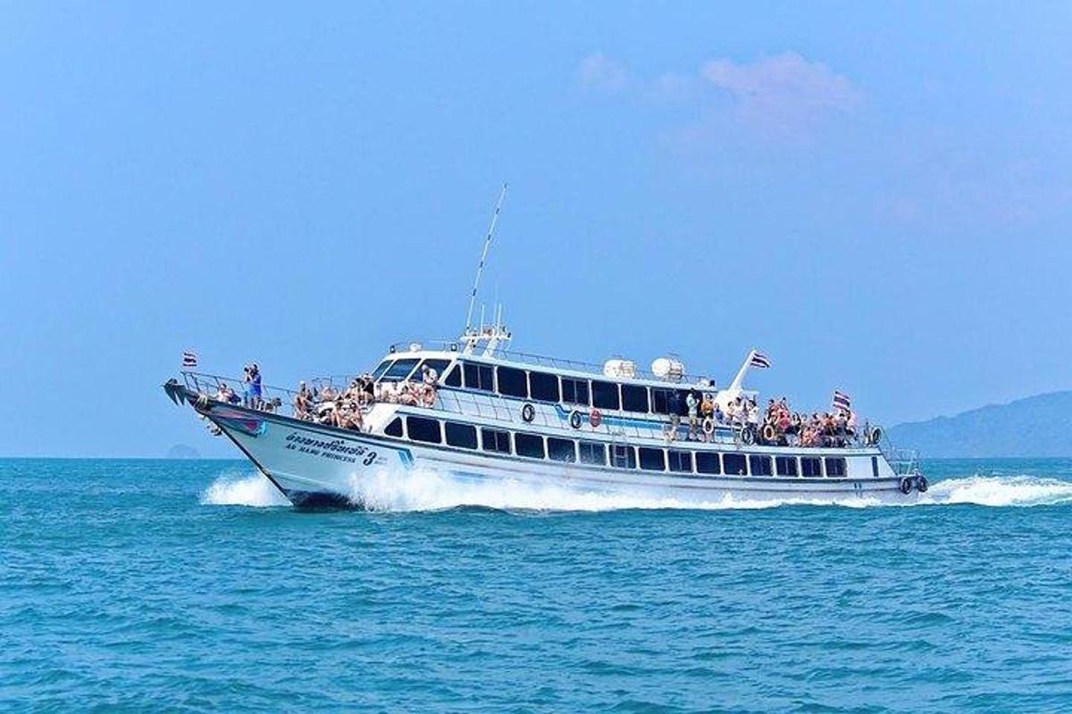 a group of people on a boat in the water