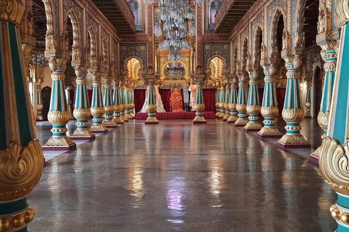 an ornate room with a long hallway with columns and a ceiling