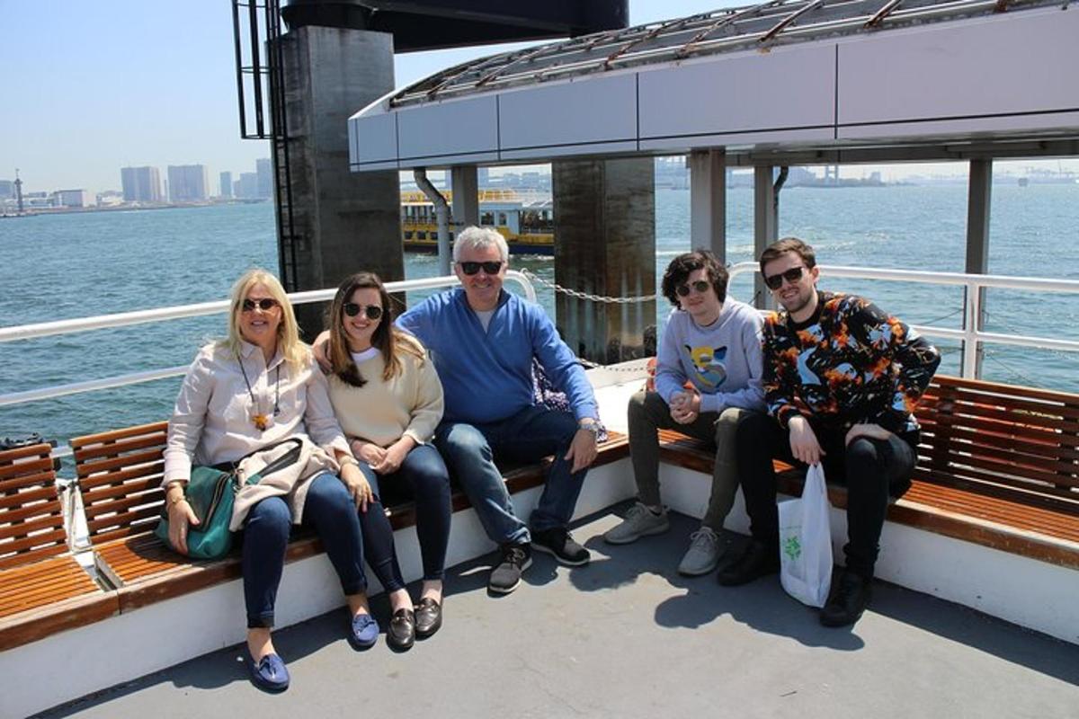 a group of people sitting on a boat