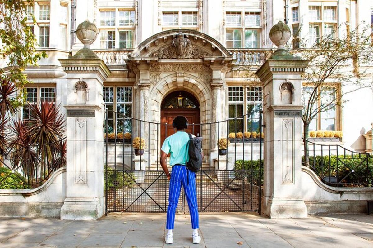 a man standing in front of a building