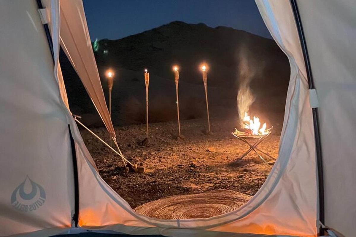 a view of a tent with a fire in it