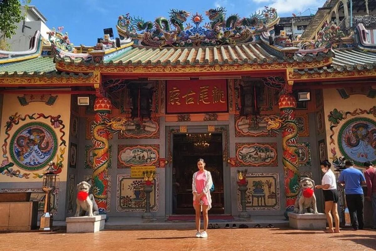 a woman standing in front of a building