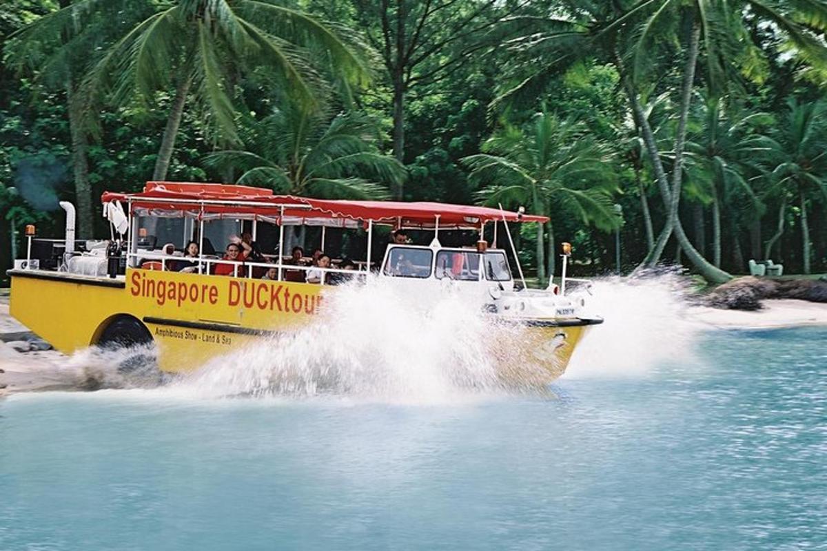 a yellow boat in the water with people on it