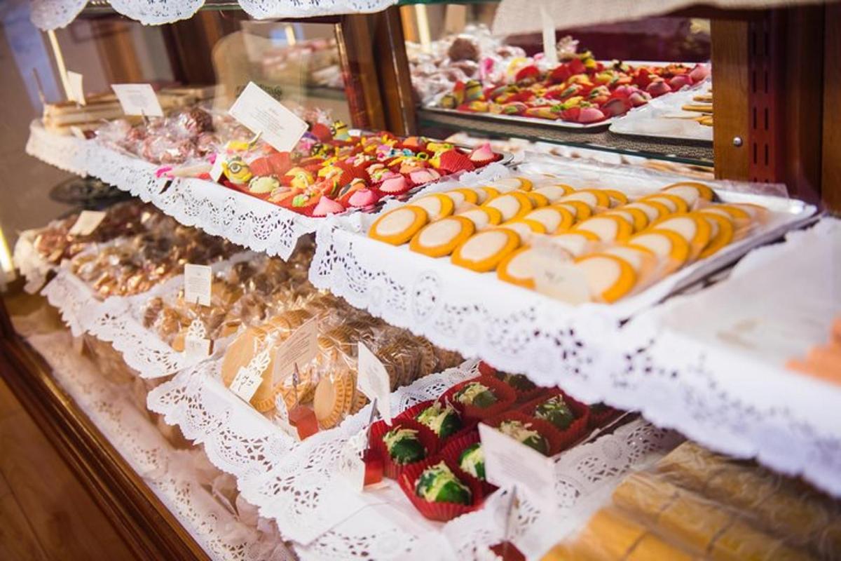 a display case with many different types of desserts