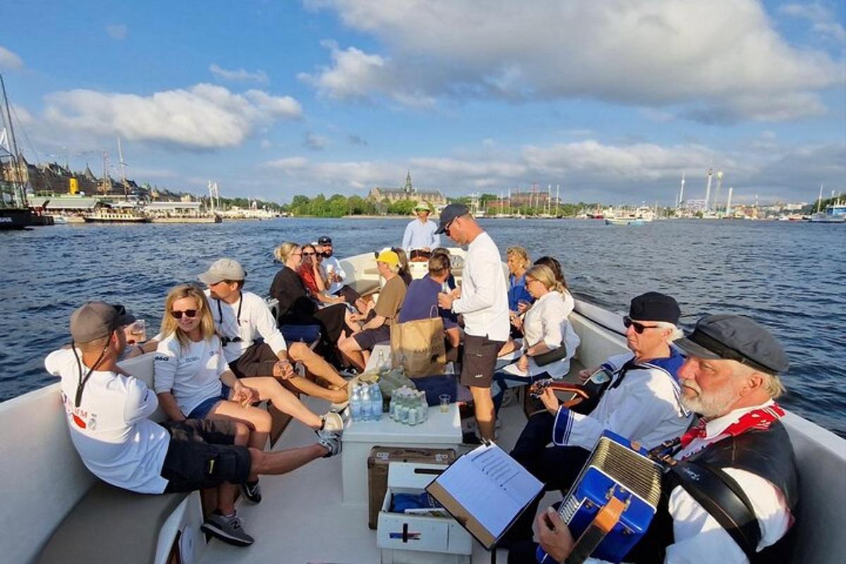 a group of people on a boat in the water