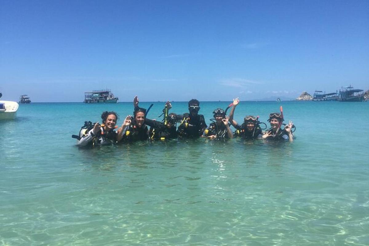 a group of people swimming in the water