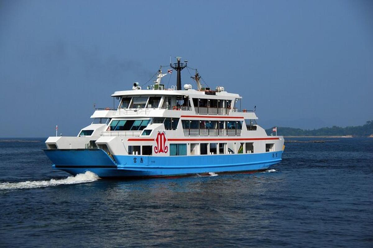 a blue and white boat on the water