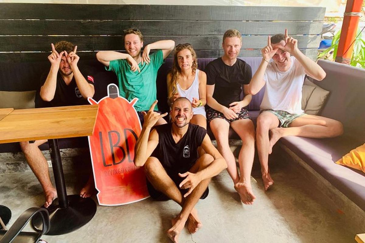 a group of people sitting on a bench