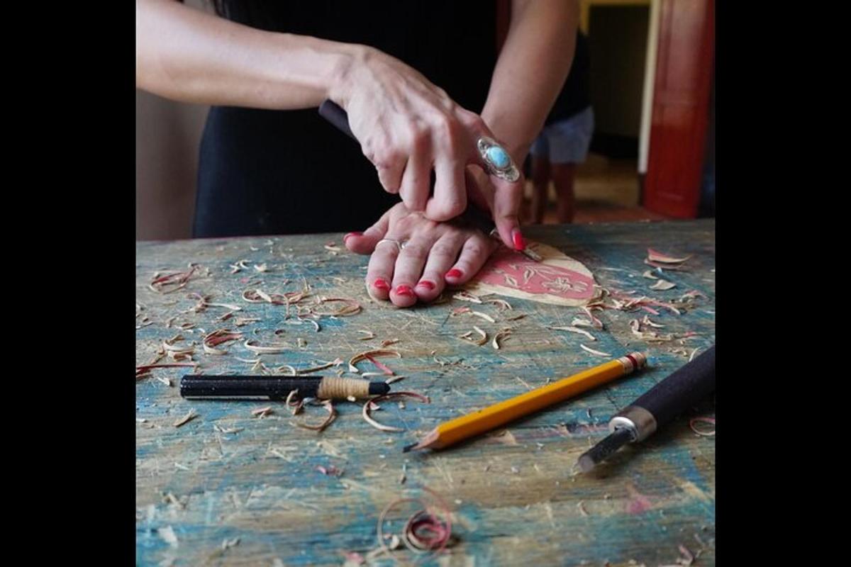 a person with their hands on top of a table