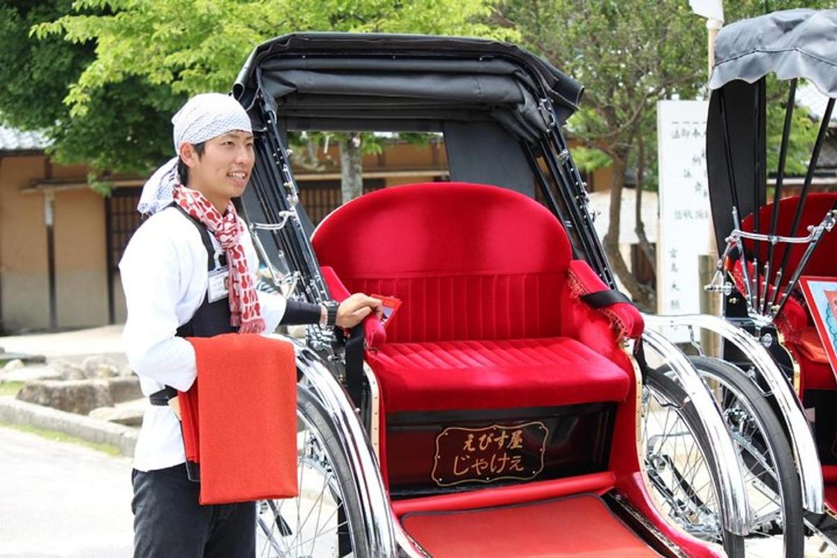 a man standing next to a red rickshaw
