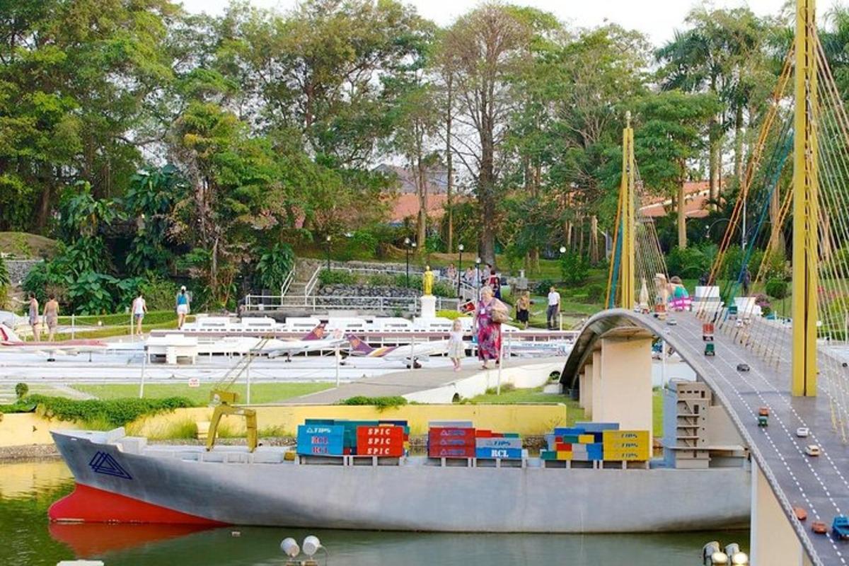 a toy boat with a train on it in the water