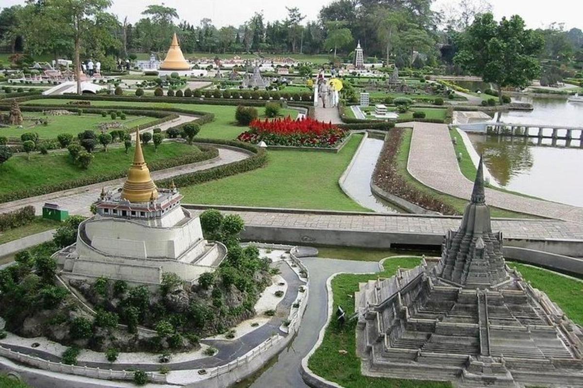 an aerial view of a park with a palace and gardens
