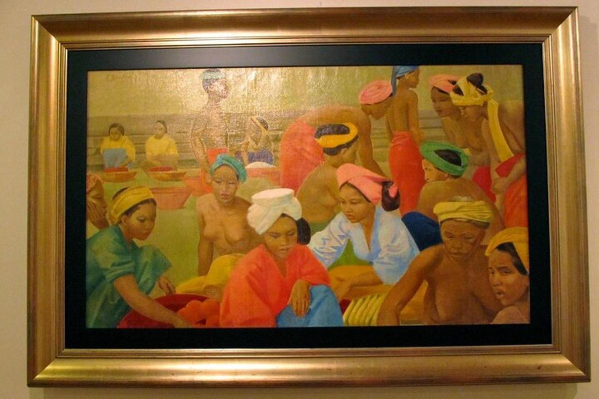 a painting of a group of people on a wall