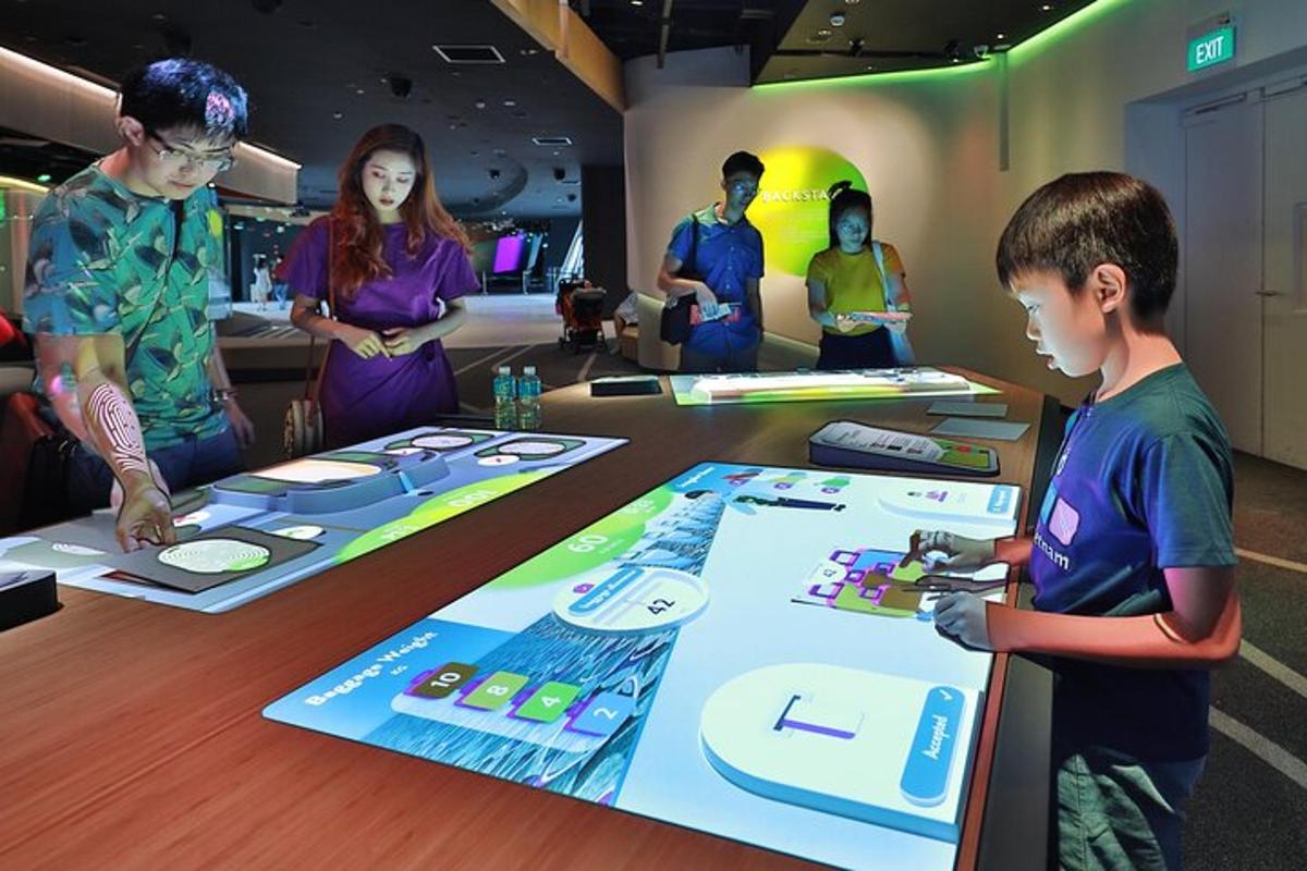 a group of people standing around a table playing a game