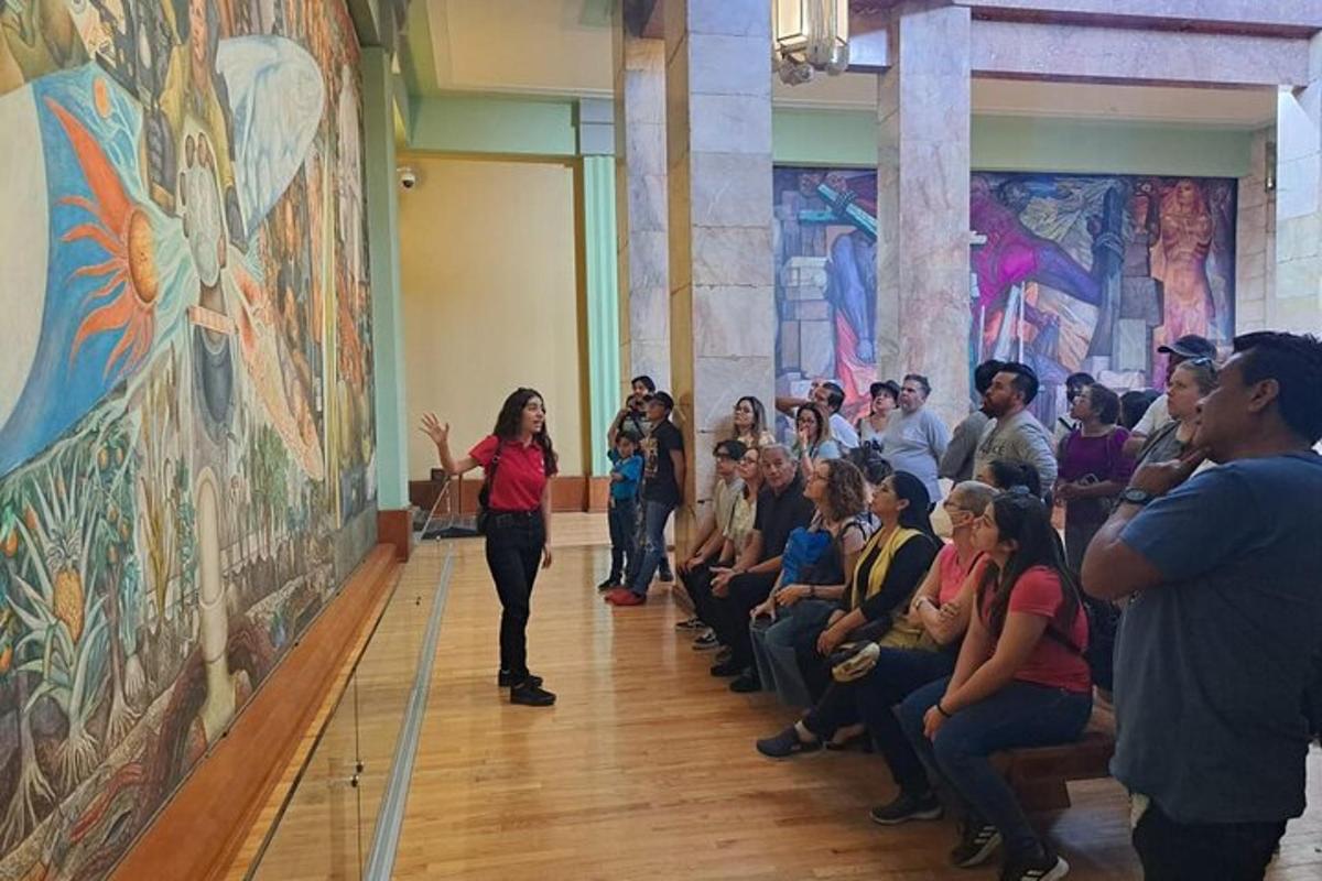 a woman standing in front of a crowd of people