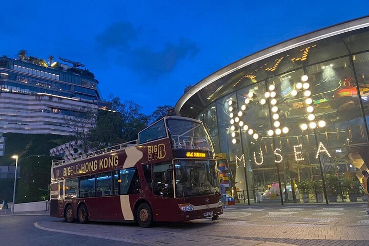 a double decker bus parked in front of a building