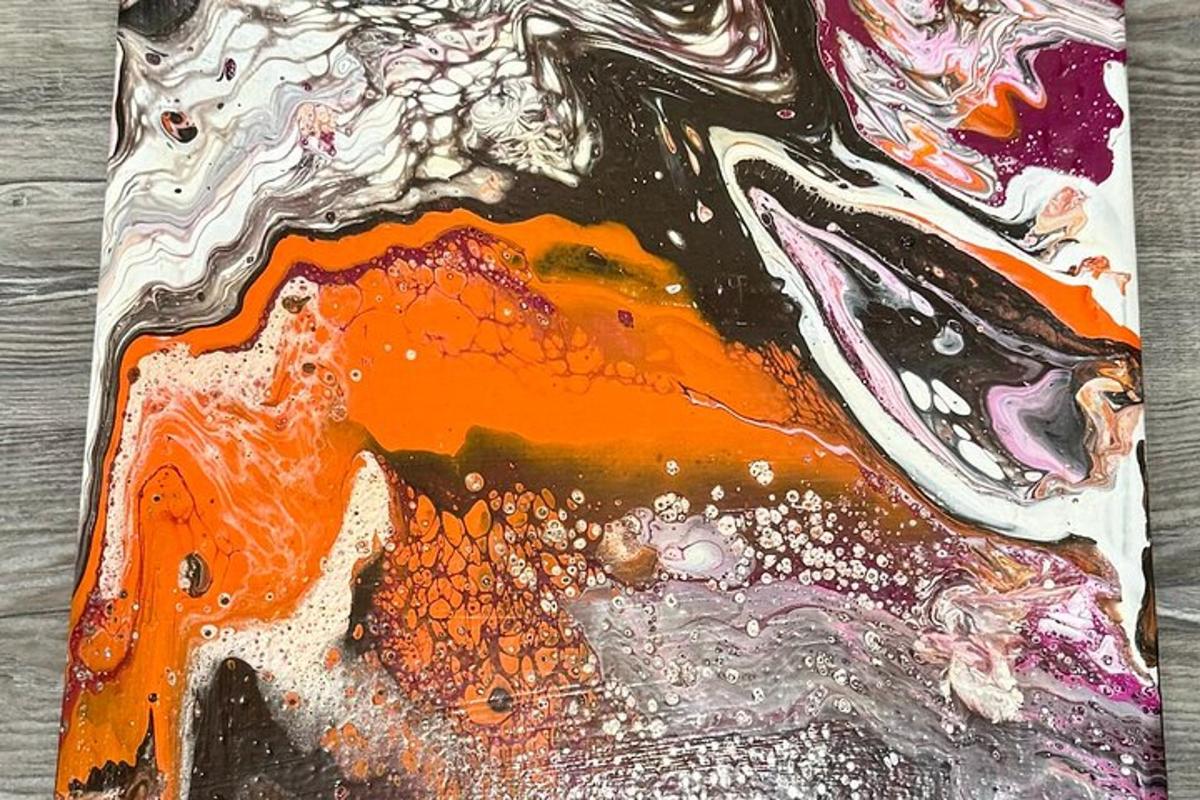 an abstract painting with orange and white