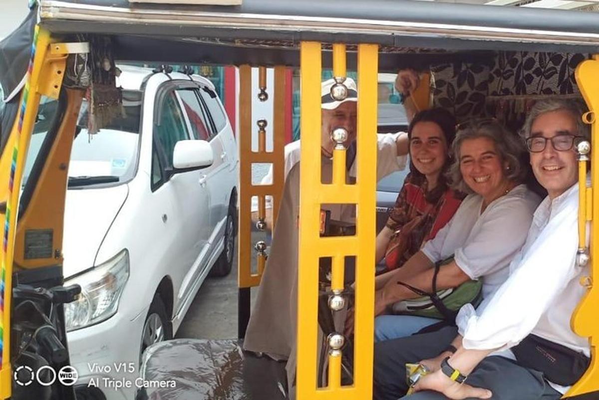 a group of people sitting inside of a vehicle