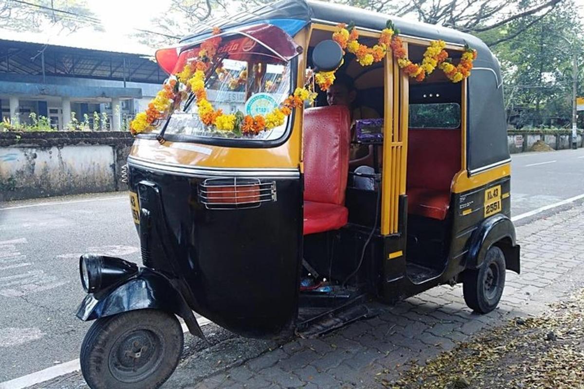 a small vehicle parked on the side of the road