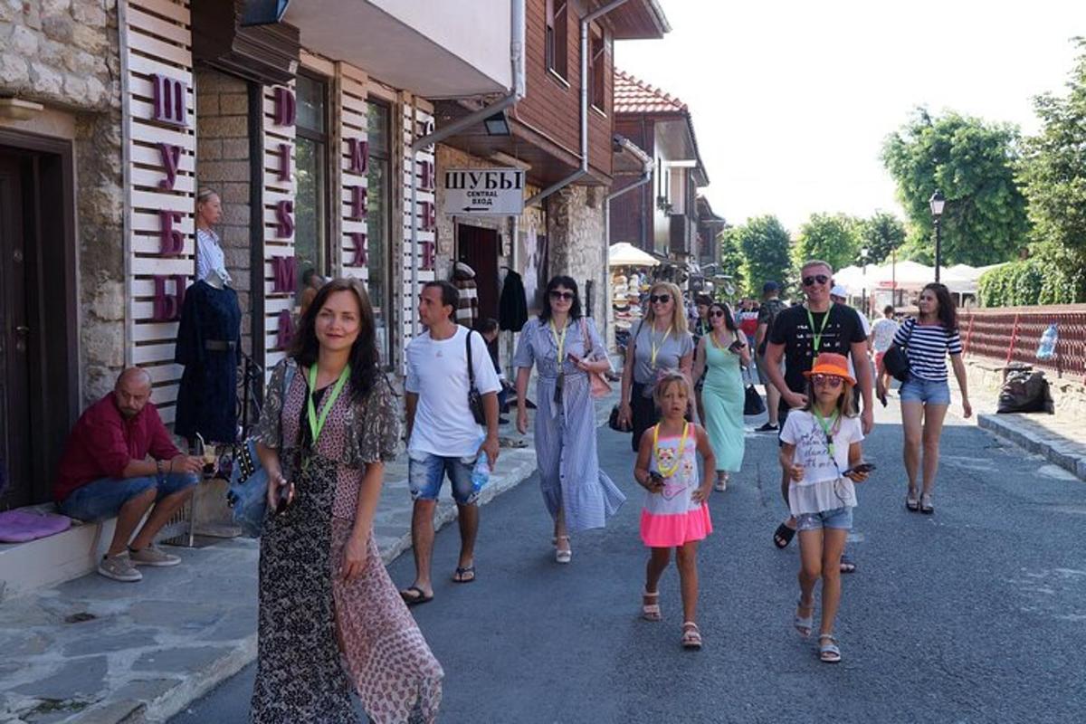 a group of people walking down a street