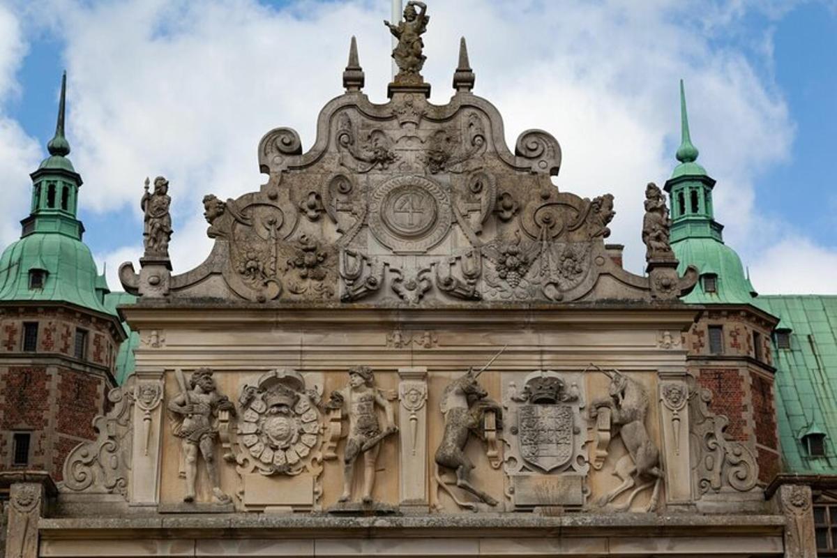 a building with a statue on the top of it