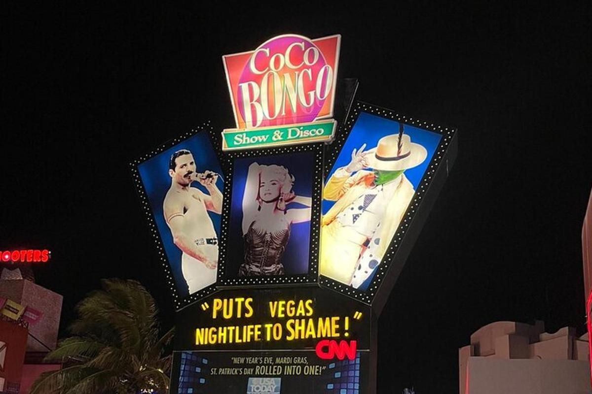 a sign with two men in pictures on it