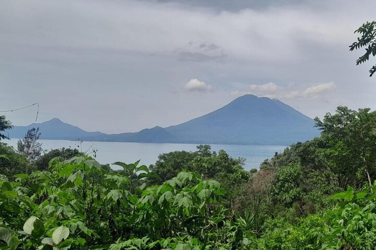 a view of a mountain and a body of water