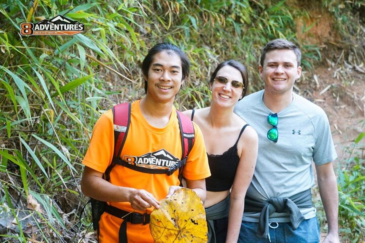 a group of three people posing for a picture