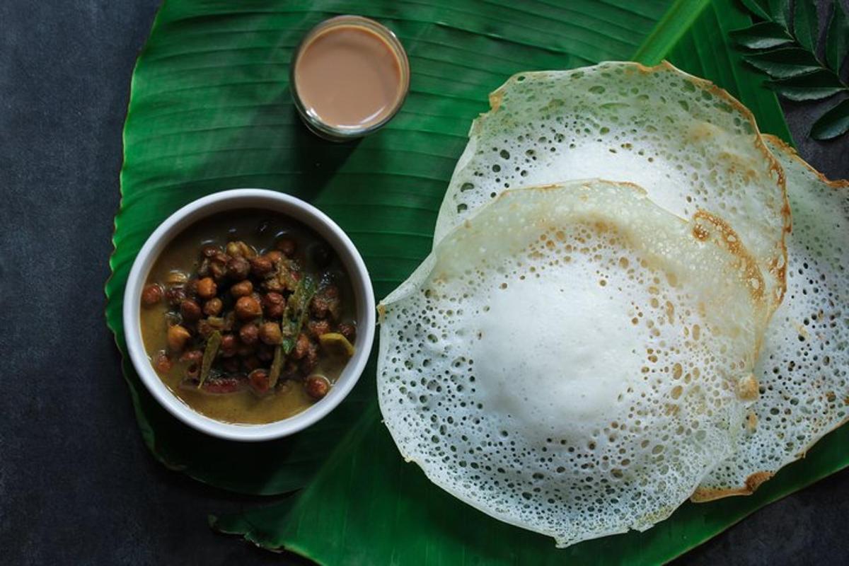 a plate of food with a bowl of soup and a tortilla