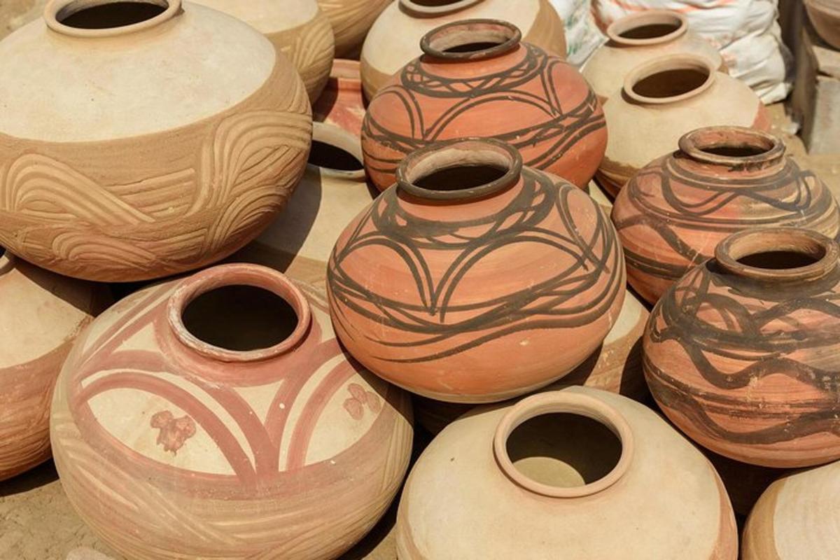 a group of vases sitting on a table