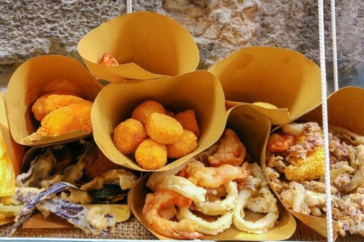 a group of bowls filled with different types of food
