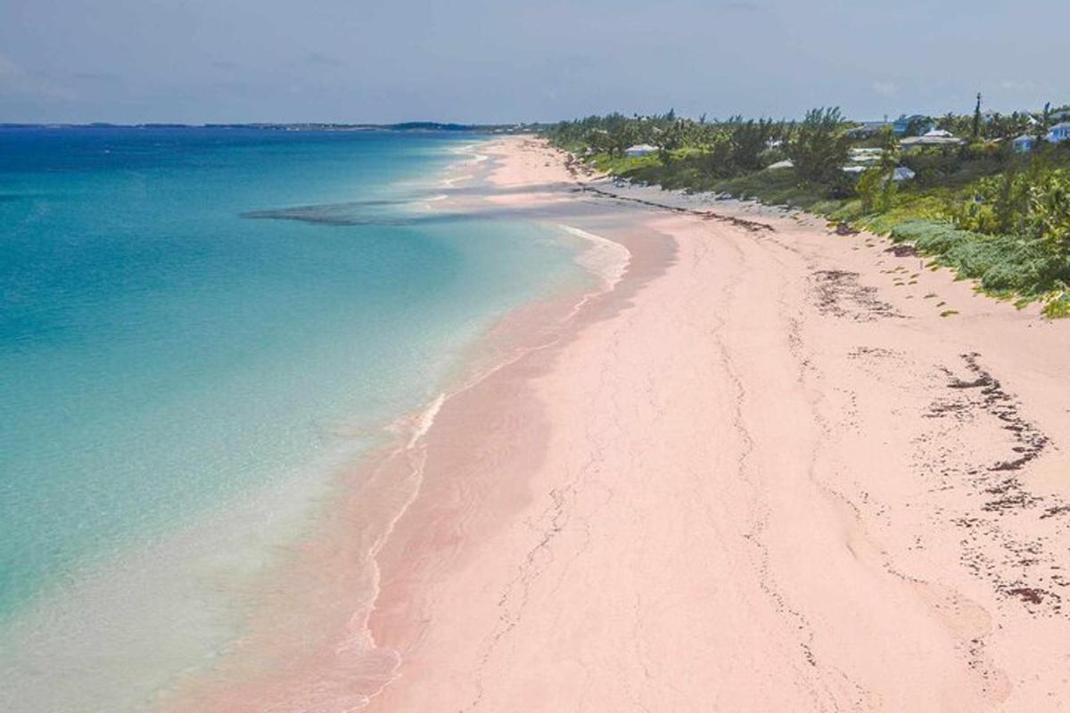 an aerial view of a sandy beach in the ocean
