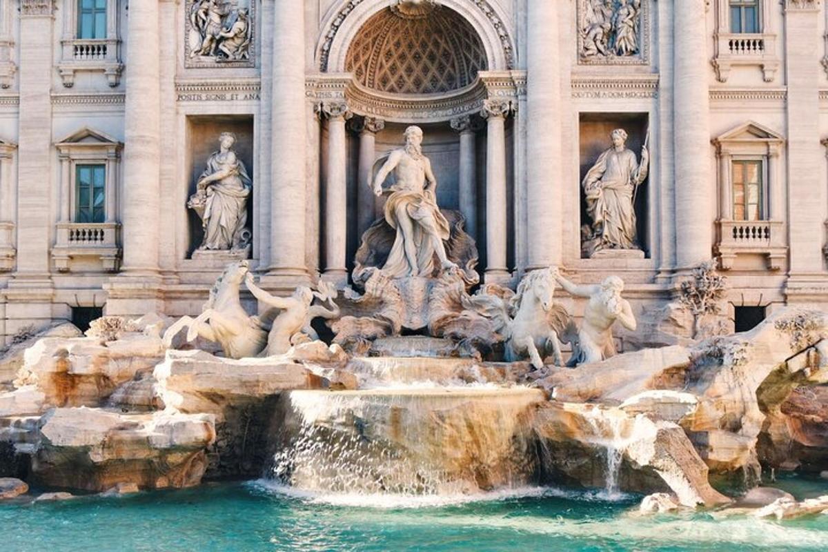 une fontaine devant un bâtiment avec des statues