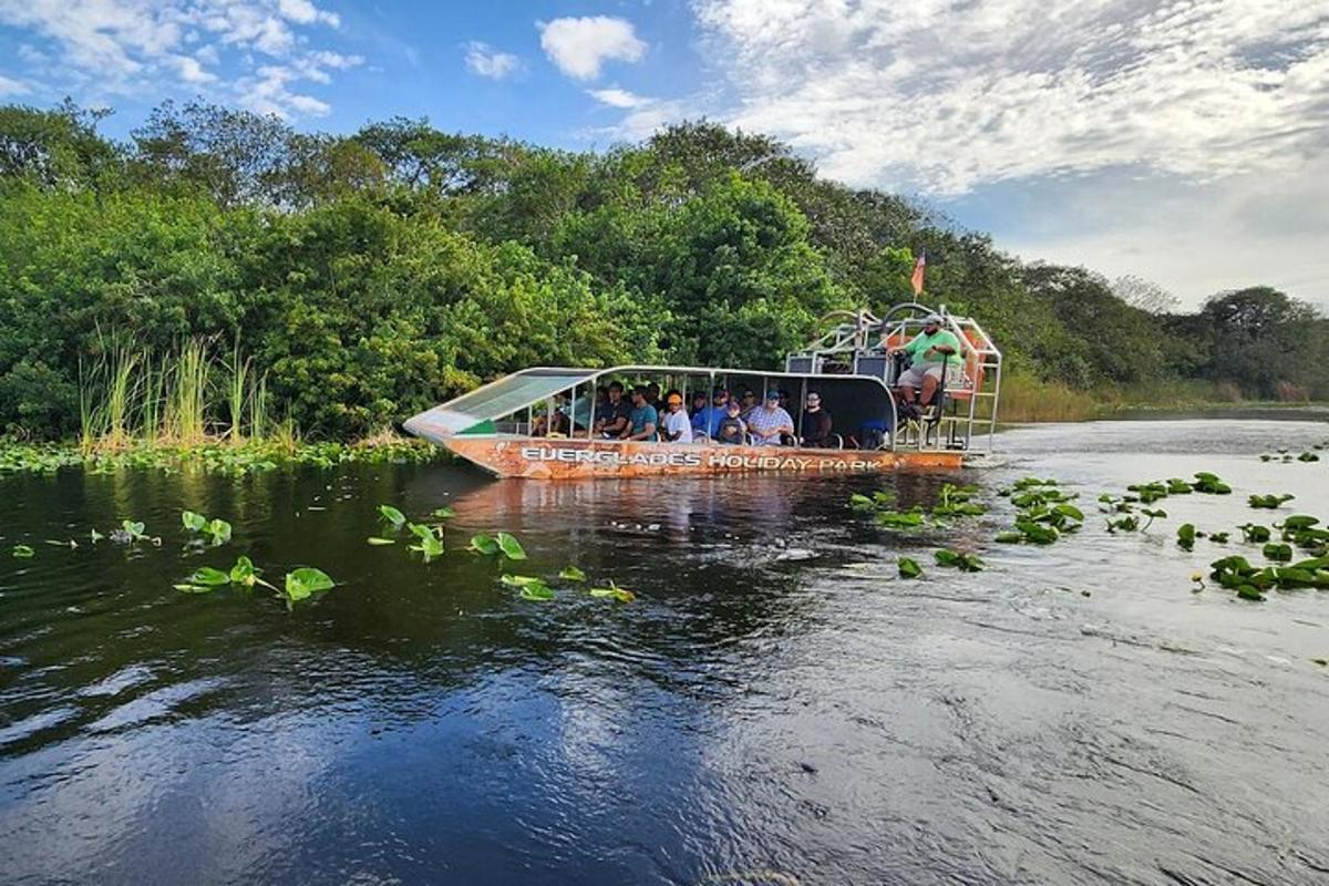 a group of people on a boat on a river
