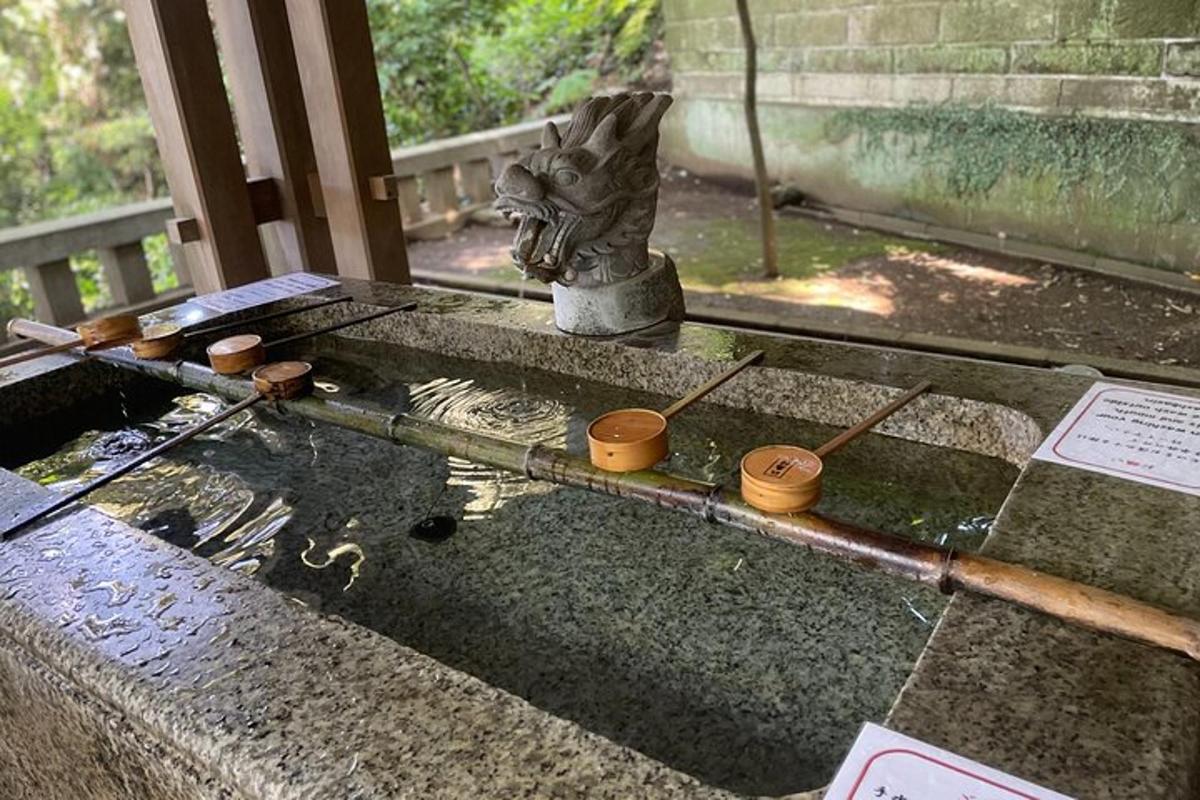 a museum exhibit of a table with a statue on it