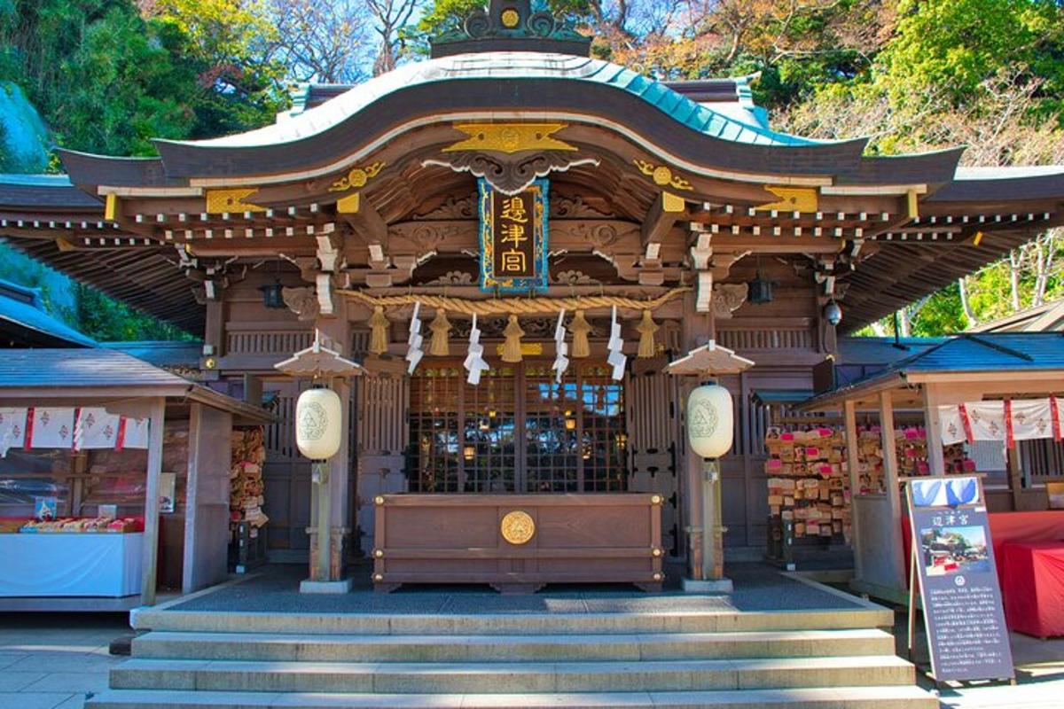a building with a shrine with steps in front