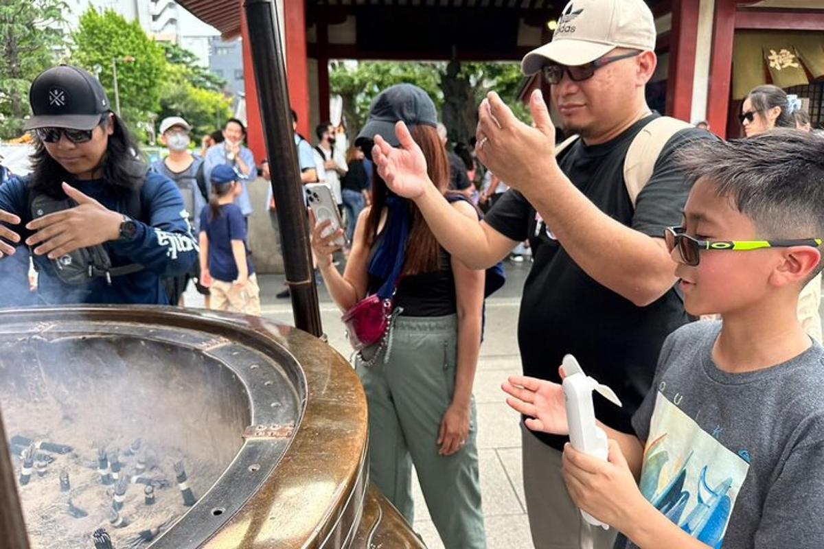 a group of people looking at a display of birds