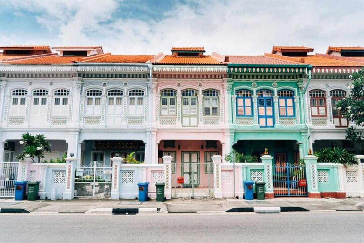 a large building with colorful trim on a street