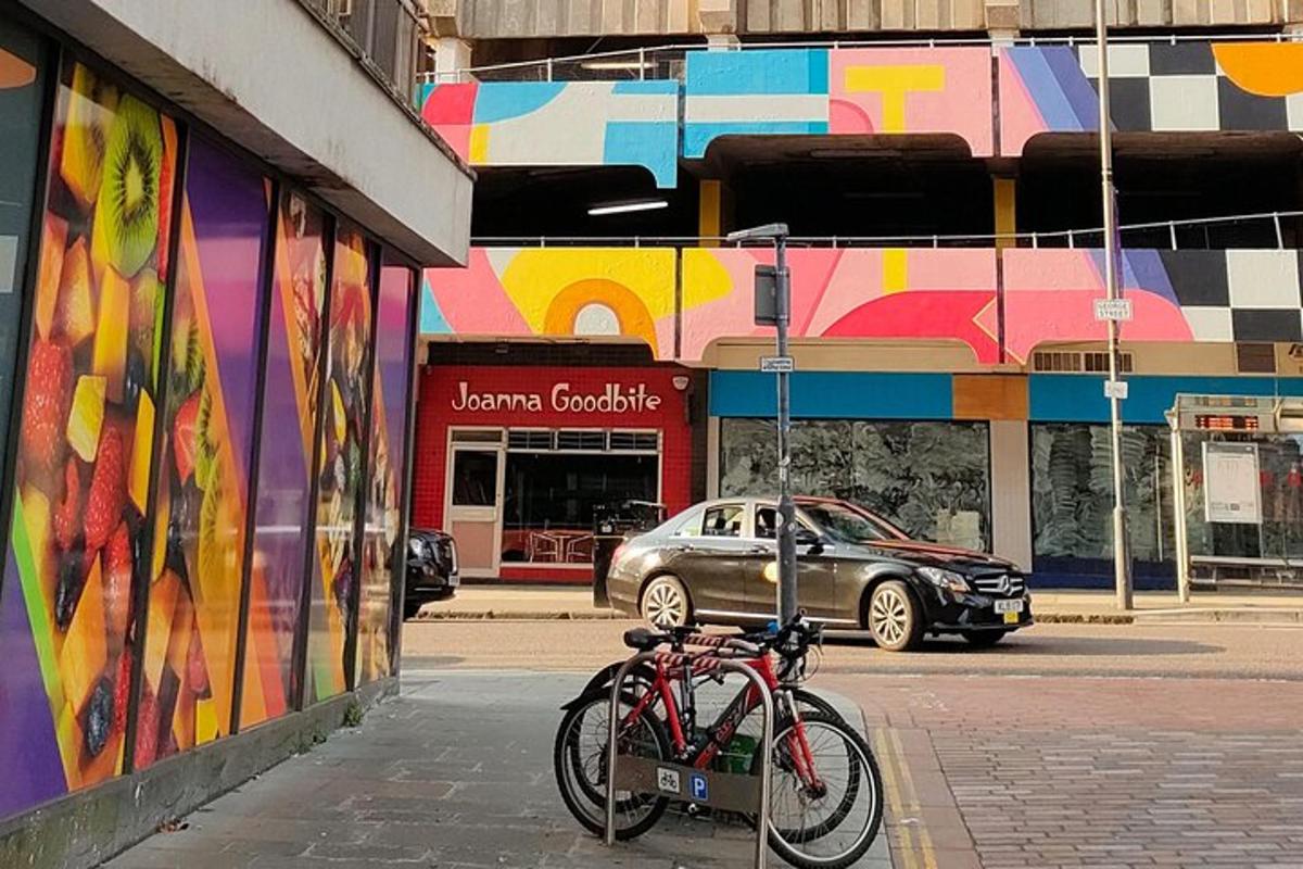 a couple of bikes parked on the side of a street