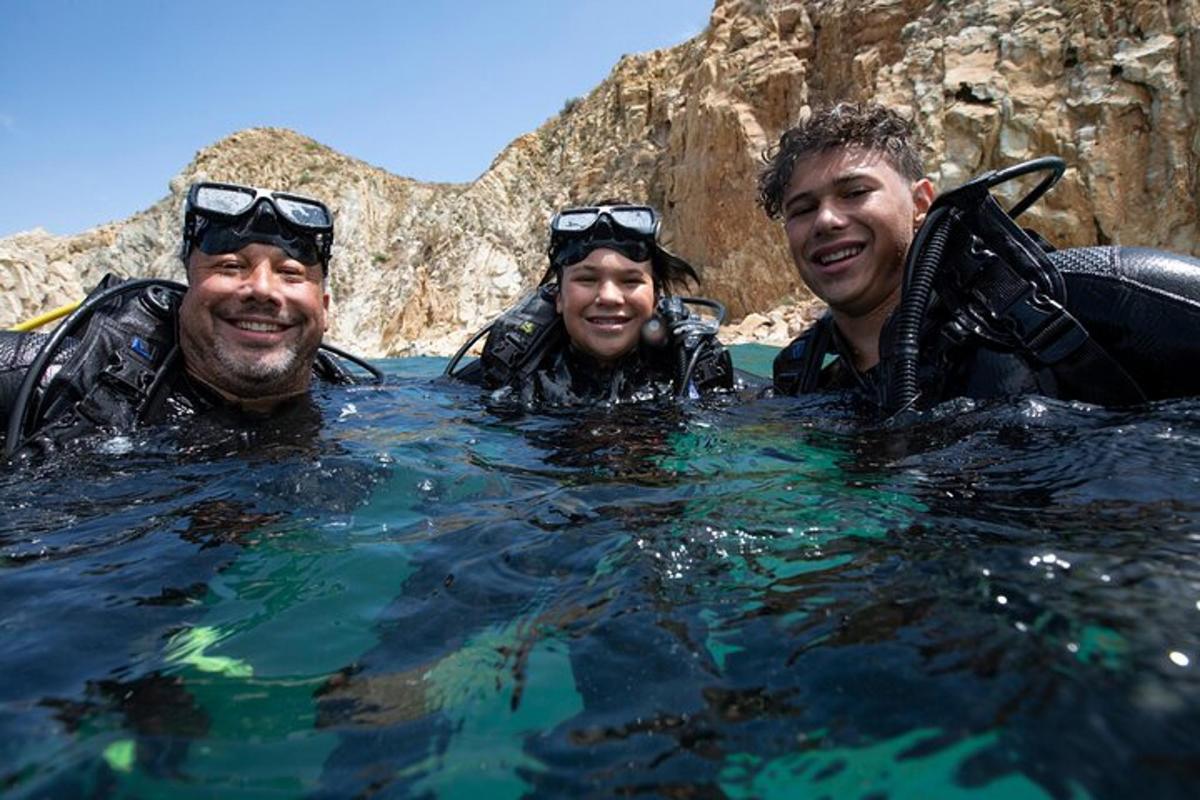 a group of three people in the water