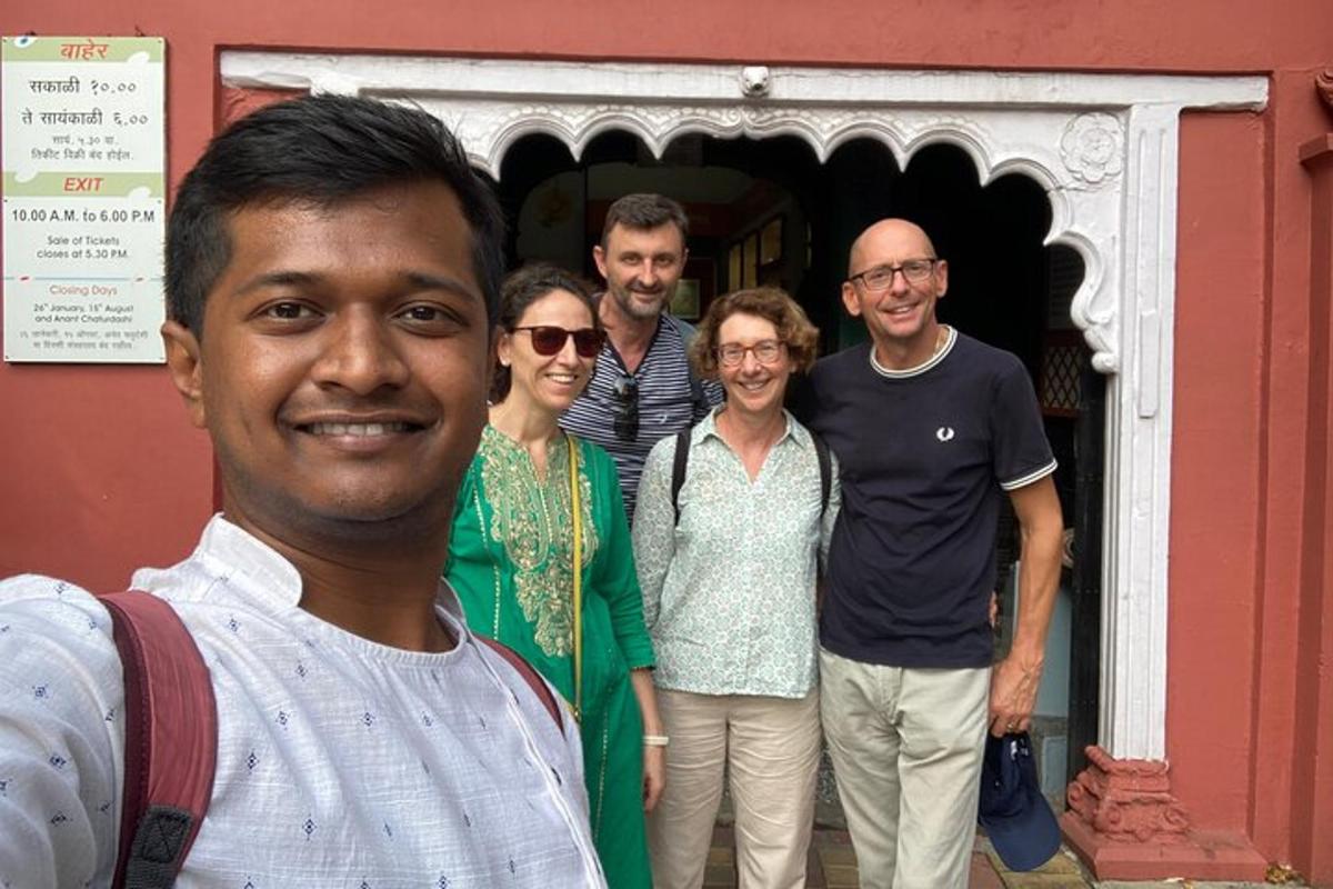 a group of people standing in front of a building