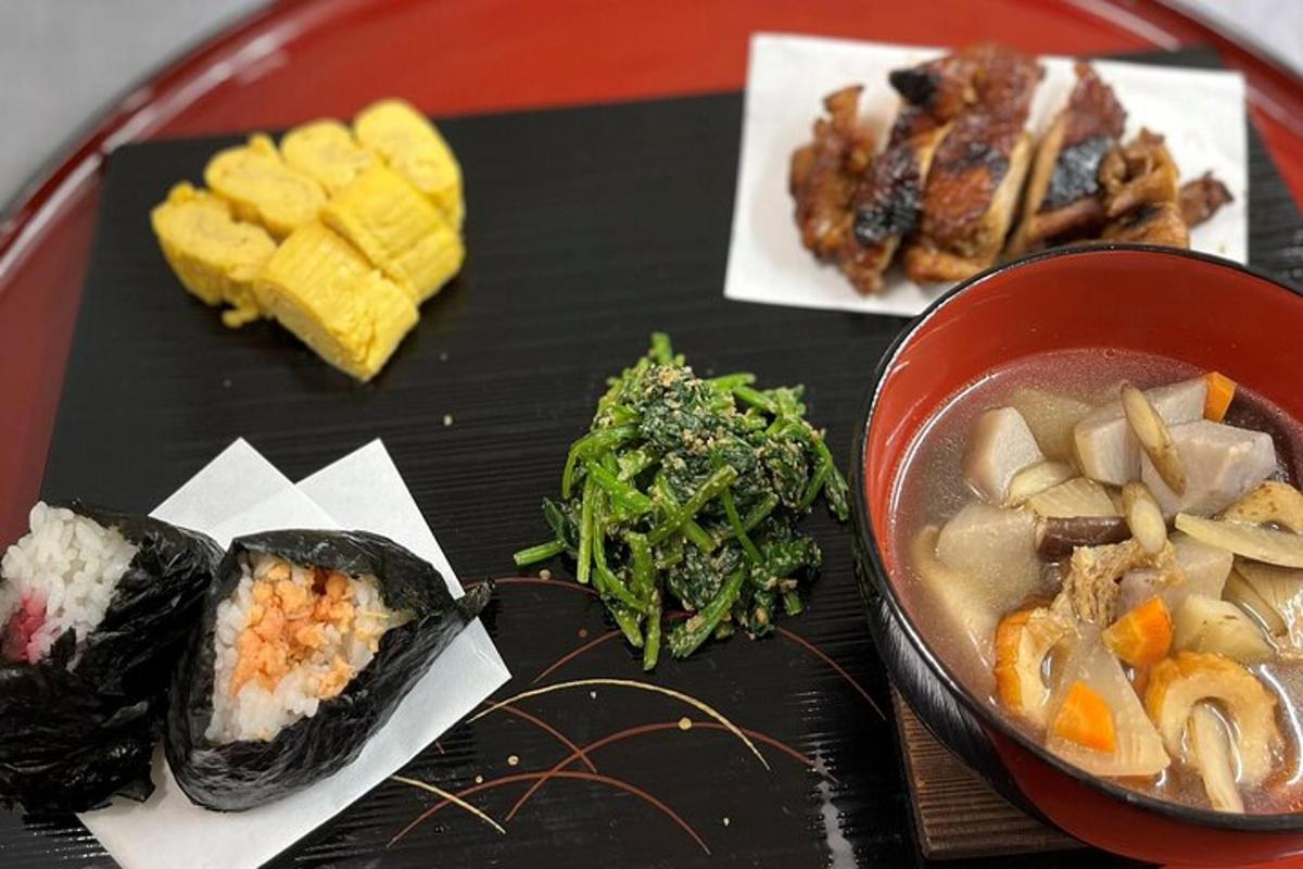 a plate of food with a bowl of soup and vegetables