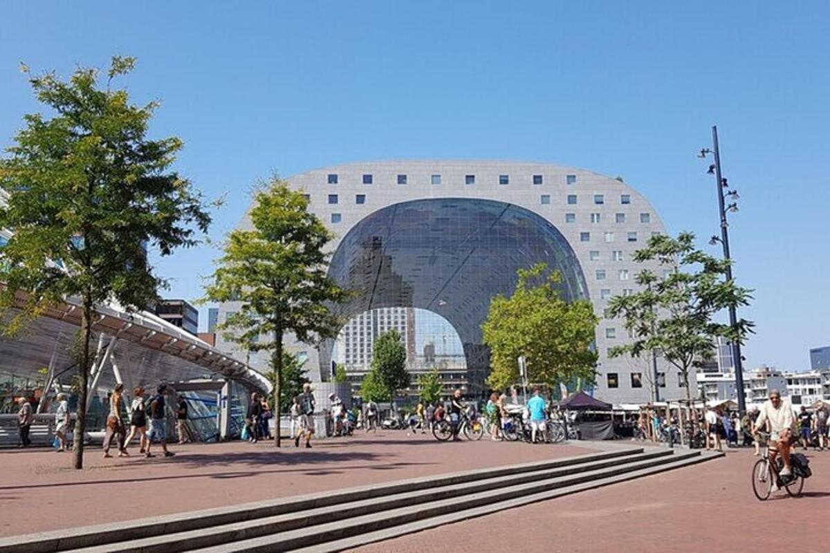 a large building with a lot of people in front of it