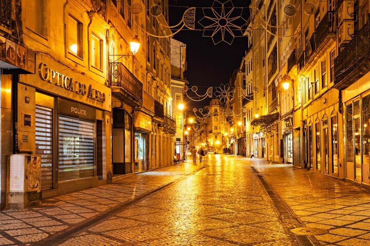 an empty city street at night with lights