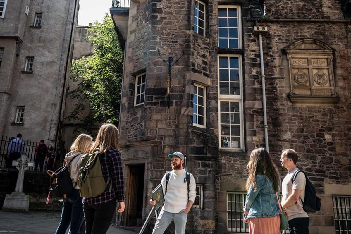 a group of people walking in front of a building